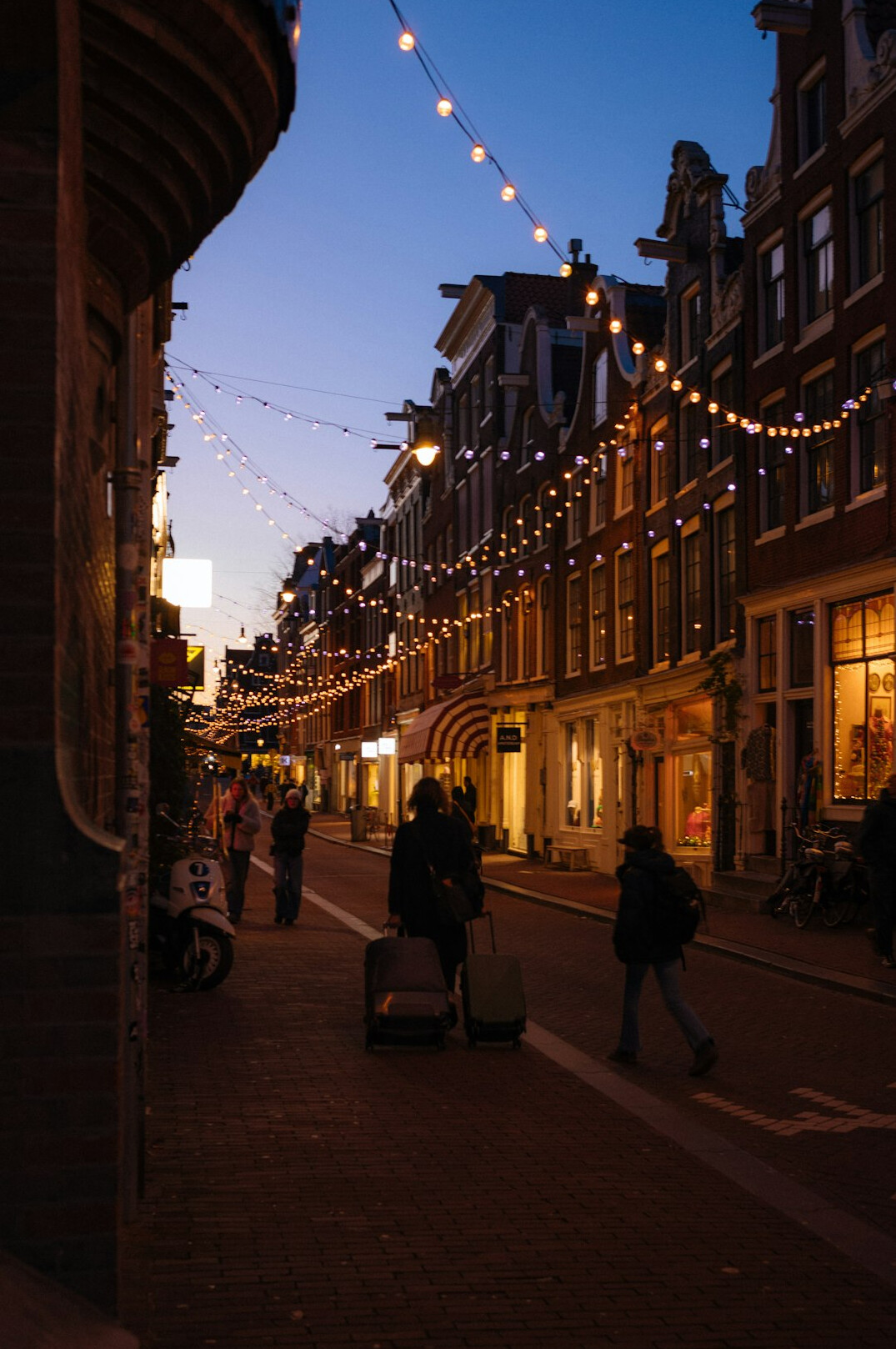 Elegant city street with cafes in the evening