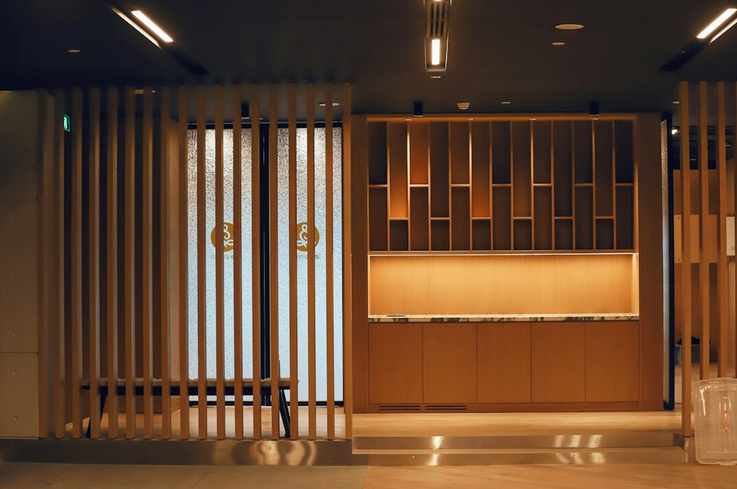 Modern office reception desk with warm lighting